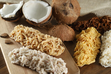 Cocada, coconut candy. Composition on wooden background