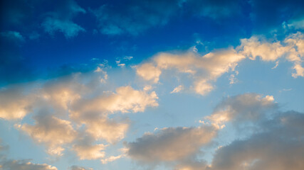Sky with clouds and evening sun