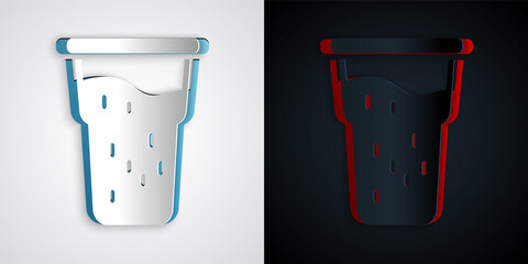 Paper cut Glass of beer icon isolated on grey and black background. Paper art style. Vector