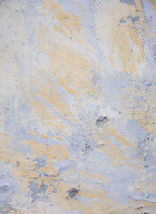 Old yellow gray surface. Cement wall with coarse texture. Decorative vintage background.