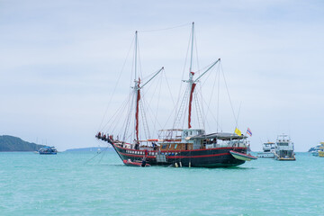 Fototapeta na wymiar Beautiful pirate ship azure sea, sunny weather
