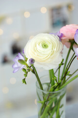 Beautiful bouquet with spring ranunculus and freesias