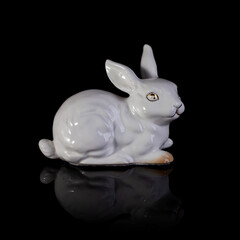porcelain figurine of a rabbit. easter white bunny. antique figurine