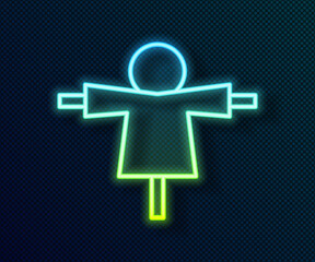 Glowing neon line Scarecrow icon isolated on black background. Vector