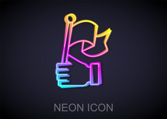 Glowing neon line Hand holding flag icon isolated on black background. Victory, winning and conquer adversity concept. Vector