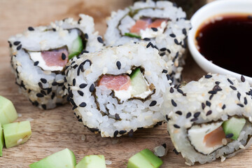 made from rice and trout or salmon with vegetables sushi food