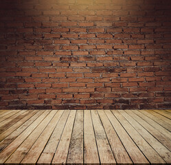 Old wood table with abstract old brick wall with light background for product display