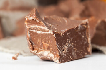 broken into pieces and crumbs milk chocolate