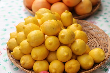 Fruit, yellow lemons in a basket