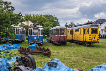 Rusty vehicles on so called tram cemetery in Skorosze area of Warsaw, Poland