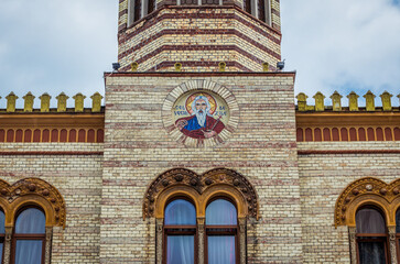 Fototapeta premium Parish house facade of Church of the Holy Assumption of the Blessed Virgin in old town of Brasov city, Romania