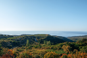 Fototapeta premium The landscape of mountains and sea on autumn day