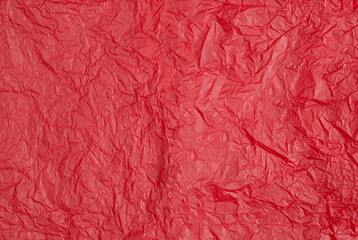 Fototapeta premium Red crumpled paper or sheet texture background for Design. Wallpaper for text. Copy space.