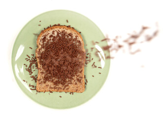 Typical dutch chocolate sprinkles falling (hagelslag)