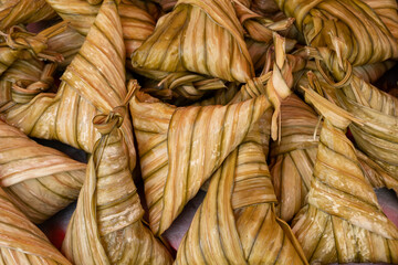 Close up of Triangular Steamed sticky rice.Image of Local Dessert in south of thailand.