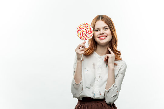 woman licking lollipop pleasure sweet candy joy