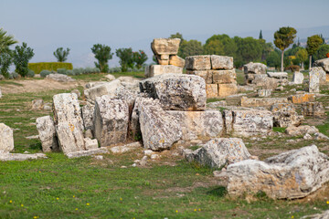 Beautiful ruins of old stones in ancient city of Hierapolis, Turkey.