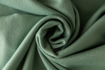 soft khaki fleece, coiled, background