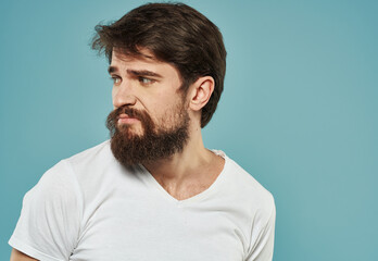 Fototapeta premium Portrait cropped view of male bushy beard brunette model