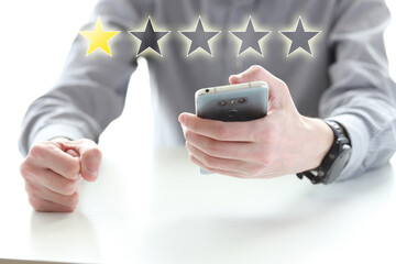 Unhappy and disappointed customer giving low rating and negative feedback in survey, poll or...