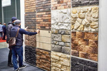 People buyers choose brick panels in showroom shop