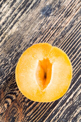 peaches or apricots together on the table