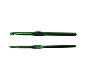 8 and 6,5 mm metallic green crochet hooks isolated on white background. Tools for thick yarn crocheting, handmade hobbies, handwork, craft, leisure