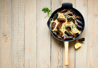 Pasta with mussels. A traditional dish of Mediterranean cuisine.