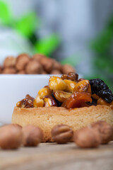 tartlets made of dough nuts and dried fruits