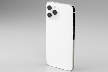 Modern white smartphone with triple-lens camera on gray background