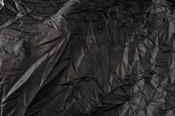 black crumpled storage cover
