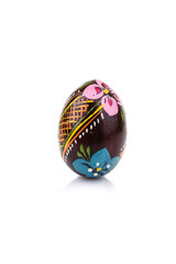 Easter egg decor on isolated on white background. Nest with handmade painted eggs pattern.