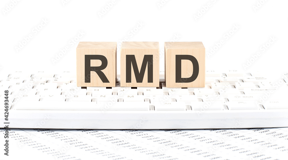 Poster rmd -word wooden block on keyboard background witn chart