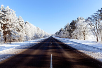 snowfall in the winter season and road asphalted