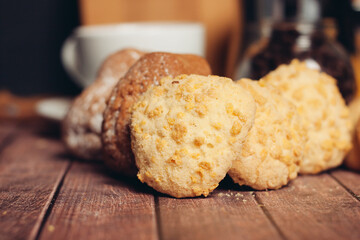 cookies on the kitchen table a cup with a drink sweets dessert