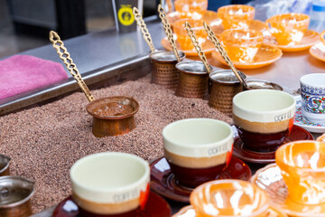 Turkey. Istanbul. Making coffee. Sale of Turkish coffee on the street.