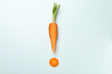 Exclamation mark made of carrot on white background