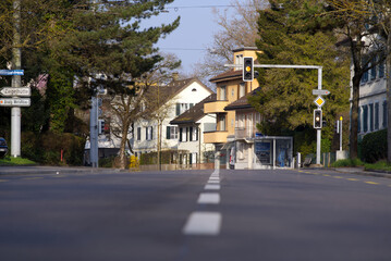 Empty road at city of Zurich, early in the morning. Photo taken April 2nd, 2021, Zurich, Switzerland.