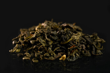 green tea on black background