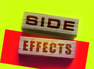 SIDE EFFECTs on wooden blocks. Pharmaceutical medical drugs Concept