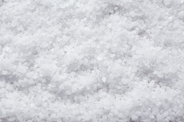 Natural sea salt as background, top view
