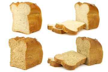 cut loaf of wholemeal bread, white bread and some slices on a white background