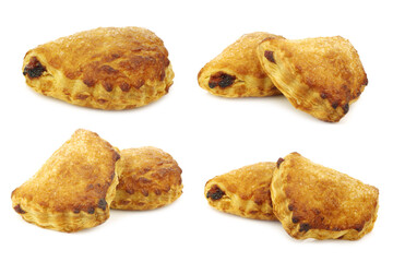 Pieces of traditional dutch pastry filled with cherries on a white background