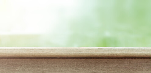 Table top and blur background.Empty wooden table and blurred modern background Ready-to-install product, bokeh, warm light.