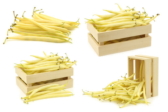 Yellow Wax Beans (Phaseolus Vulgaris) And A Bunch In A Wooden Box On A White Background