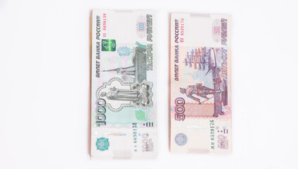 Several bills of one thousand and five hundred rubles of the Russian Federation isolated on white background