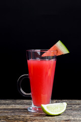 watermelon juice from watermelons and pieces of lime or lemo