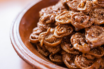 Chebakia Moroccan sweets stills with left copy space out of focus.