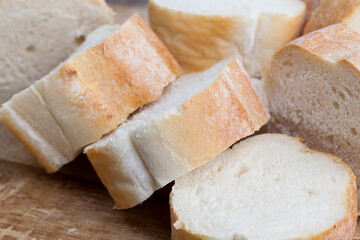 loaf of wheat baguette cut into slices