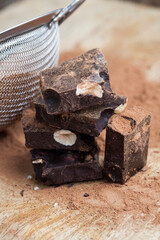 chocolate with hazelnuts broken into pieces, close up